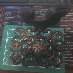 Ornate Black Metal Trivet